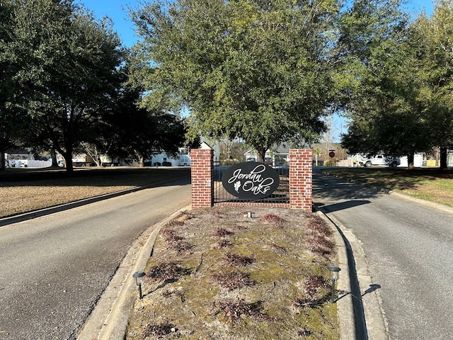 view of road with curbs