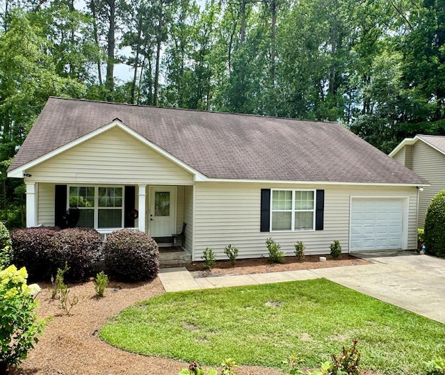 129 Eagles Landing Dr, Thomasville, GA 31792 - single story home featuring driveway, a shingled roof, a garage, and a front lawn