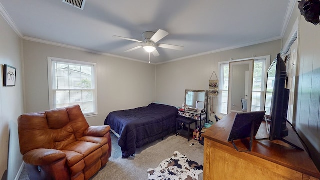 1216 Oriole Dr, Thomasville, GA 31792 - bedroom featuring crown molding, multiple windows, light colored carpet, and ceiling fan