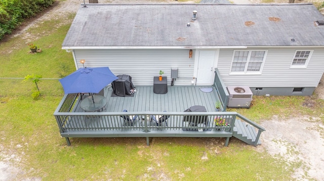 1216 Oriole Dr, Thomasville, GA 31792 - back of house featuring a wooden deck, crawl space, and roof with shingles