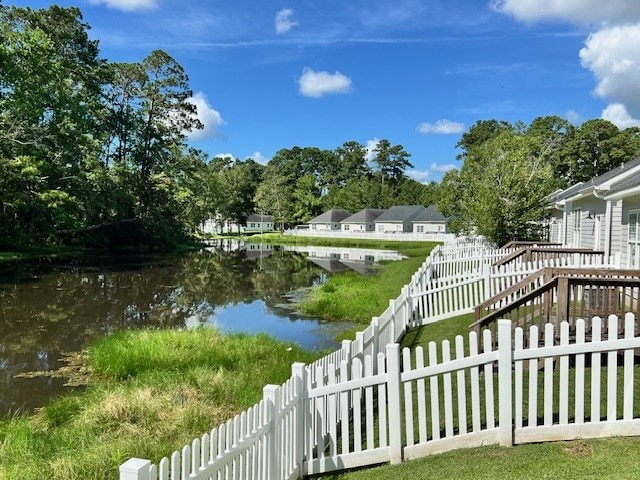 exterior space featuring a fenced backyard