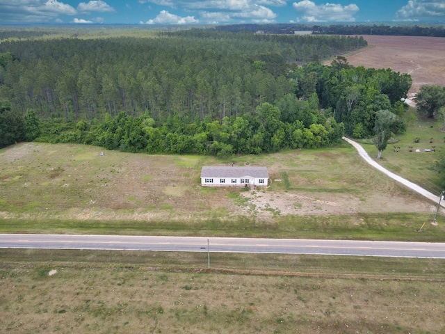 bird's eye view featuring a view of trees