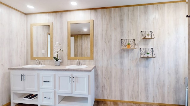 full bath featuring a sink and double vanity