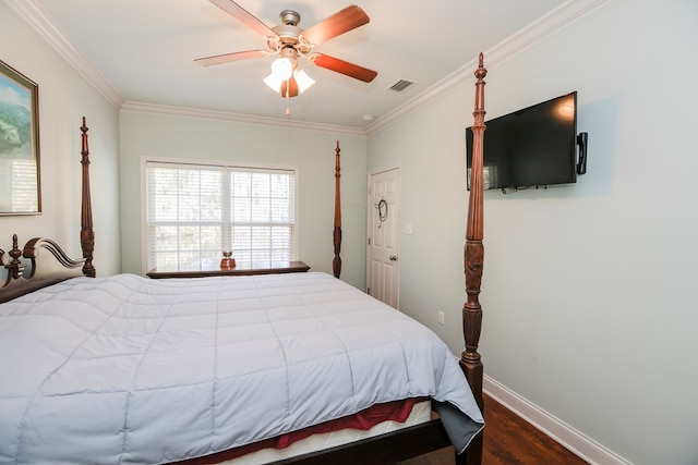 bedroom with dark hardwood / wood-style floors, ceiling fan, and ornamental molding