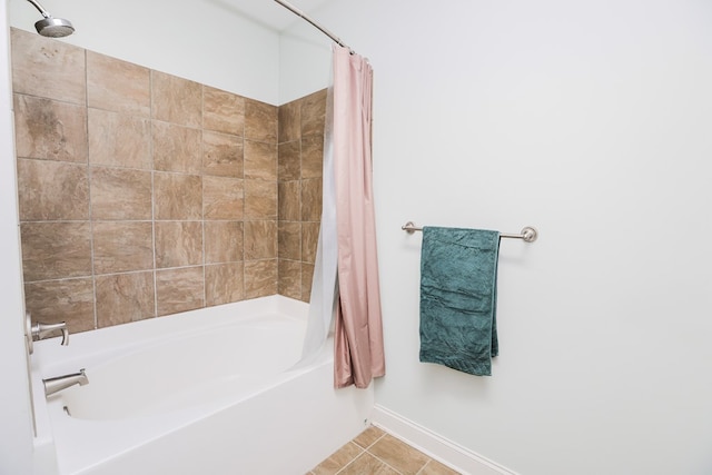 bathroom featuring shower / tub combo with curtain and tile patterned flooring