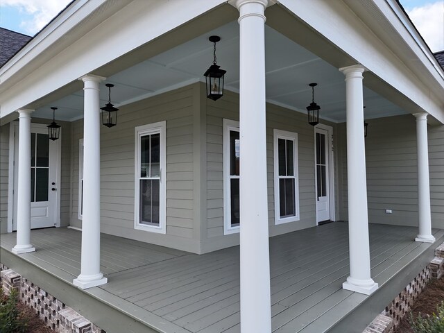 wooden deck featuring a porch