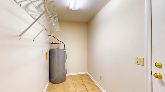 utility room with electric water heater