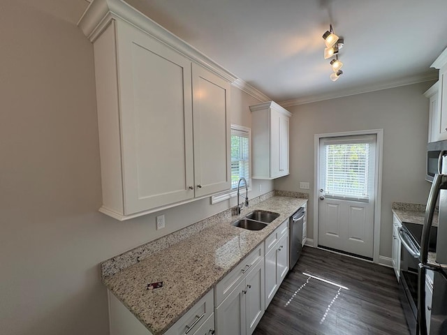 kitchen featuring a sink, stainless steel appliances, white cabinets, crown molding, and dark wood-style floors