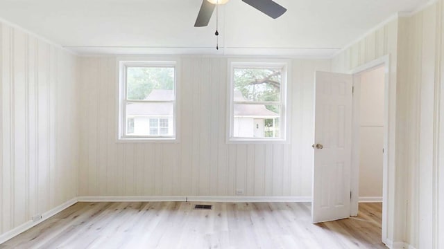 712 Young St, Thomasville, GA 31792 - spare room featuring light wood-style floors and a ceiling fan