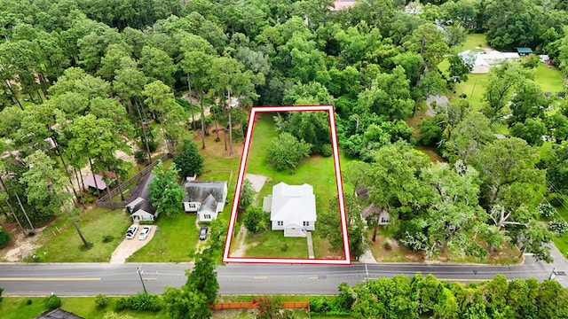 712 Young St, Thomasville, GA 31792 - aerial view of property and surrounding area featuring property parcel outlined