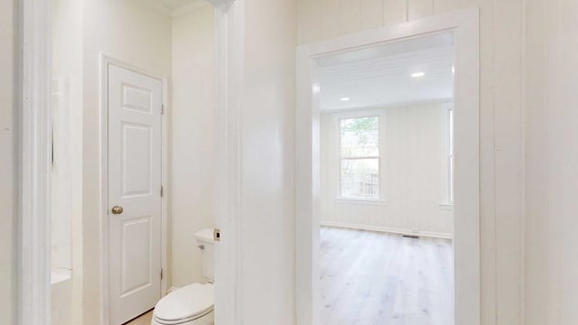 712 Young St, Thomasville, GA 31792 - bathroom with toilet and wood finished floors