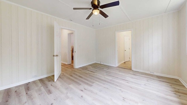 712 Young St, Thomasville, GA 31792 - unfurnished room featuring light wood-style flooring, a ceiling fan, and crown molding