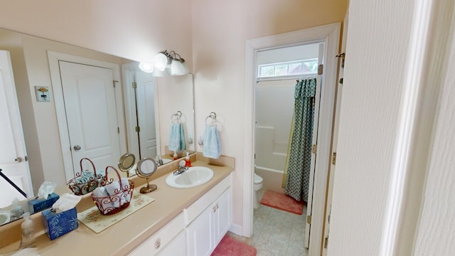 full bathroom featuring shower / bath combination with curtain, vanity, and toilet