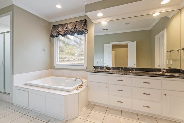 bathroom with vanity, crown molding, tile patterned floors, and plus walk in shower