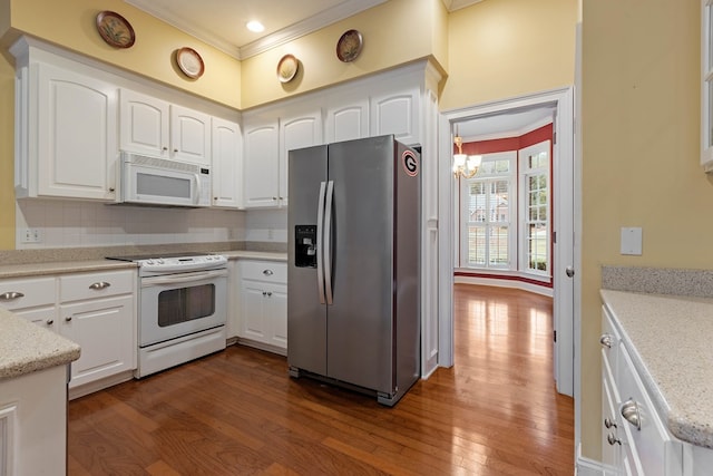 kitchen featuring dark hardwood / wood-style flooring, range with electric stovetop, white cabinets, and stainless steel refrigerator with ice dispenser