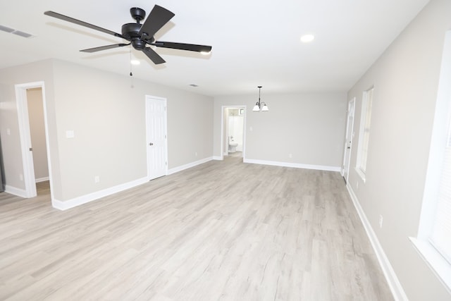 unfurnished room with ceiling fan and light wood-type flooring