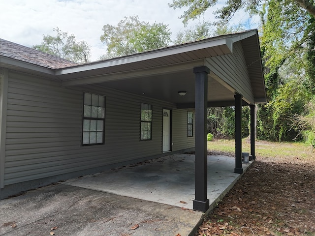 view of patio featuring a carport