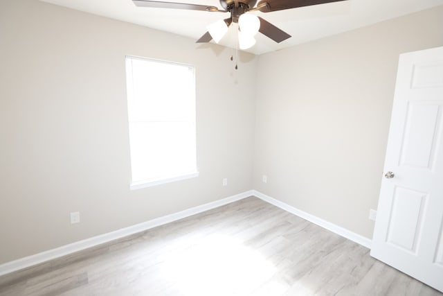 unfurnished room featuring light hardwood / wood-style flooring and ceiling fan