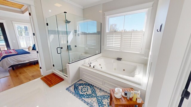 bathroom featuring independent shower and bath and crown molding