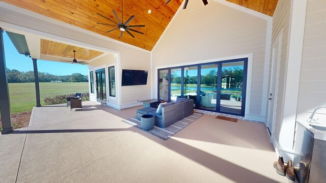 view of patio featuring outdoor lounge area and ceiling fan