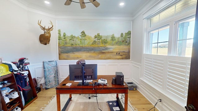 office featuring crown molding, ceiling fan, and light wood-type flooring