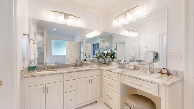 bathroom with crown molding and double vanity