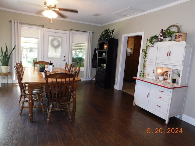 dining area with crown molding, ceiling fan, plenty of natural light, and dark hardwood / wood-style floors