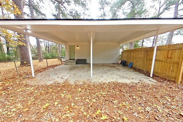 view of car parking featuring a carport