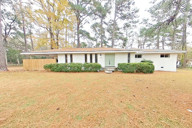 single story home featuring a front yard