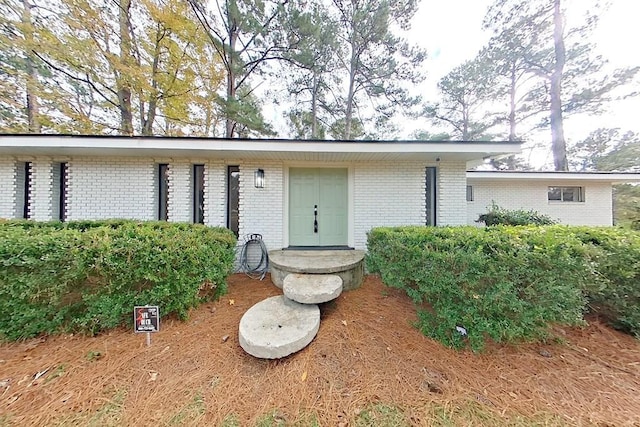 702 E Pinetree Blvd, Thomasville, GA 31792 - doorway to property with brick siding