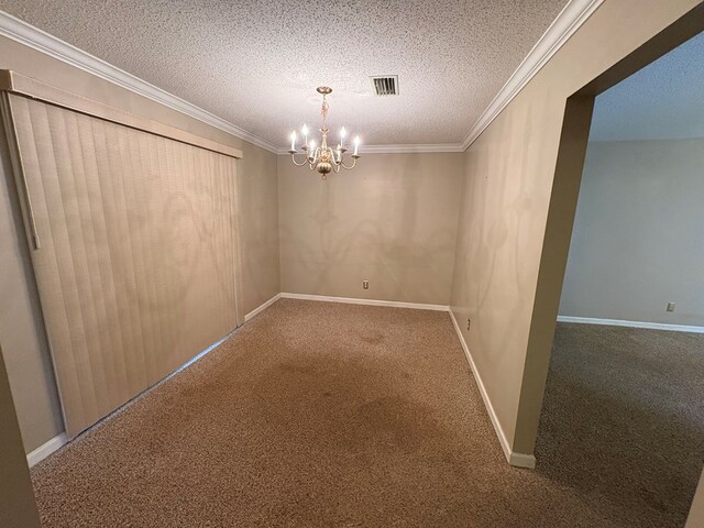 102 Spruce Pine Dr, Thomasville, GA 31757 - carpeted empty room featuring a textured ceiling, a chandelier, and crown molding