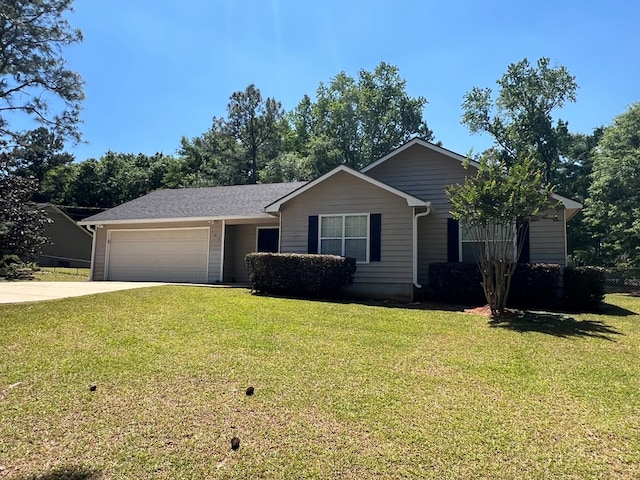 102 Spruce Pine Dr, Thomasville, GA 31757 - ranch-style house with an attached garage, concrete driveway, and a front lawn