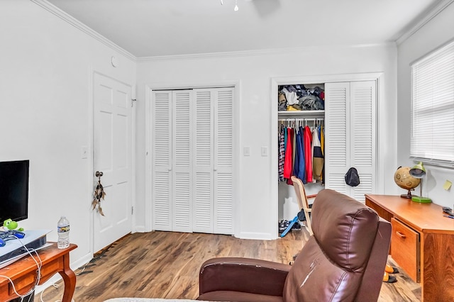 office space with hardwood / wood-style flooring and ornamental molding