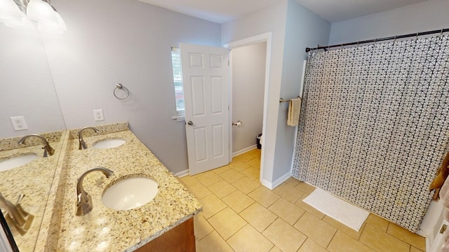 bathroom featuring vanity, tile patterned flooring, and a shower with shower curtain