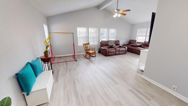 living room featuring vaulted ceiling with beams, light hardwood / wood-style flooring, and ceiling fan