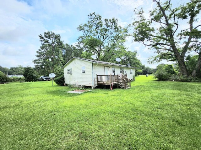 3812 Ponder Rd, Thomasville, GA 31757 - back of house with a deck and a yard