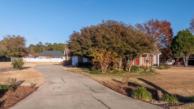 view of yard featuring a garage