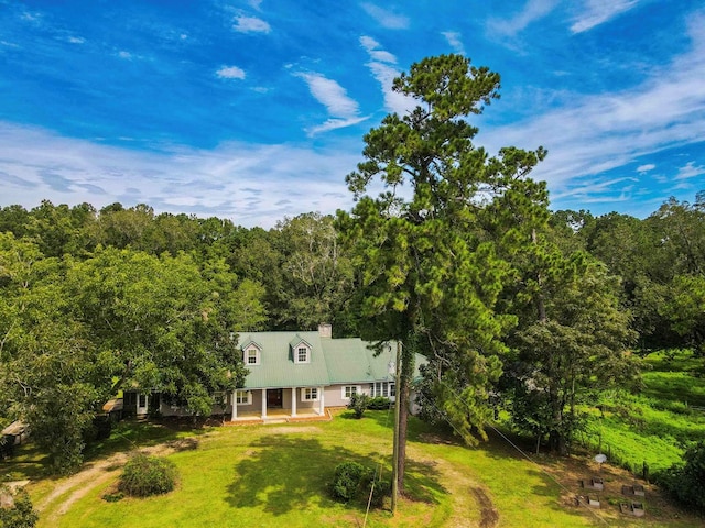 bird's eye view featuring a forest view