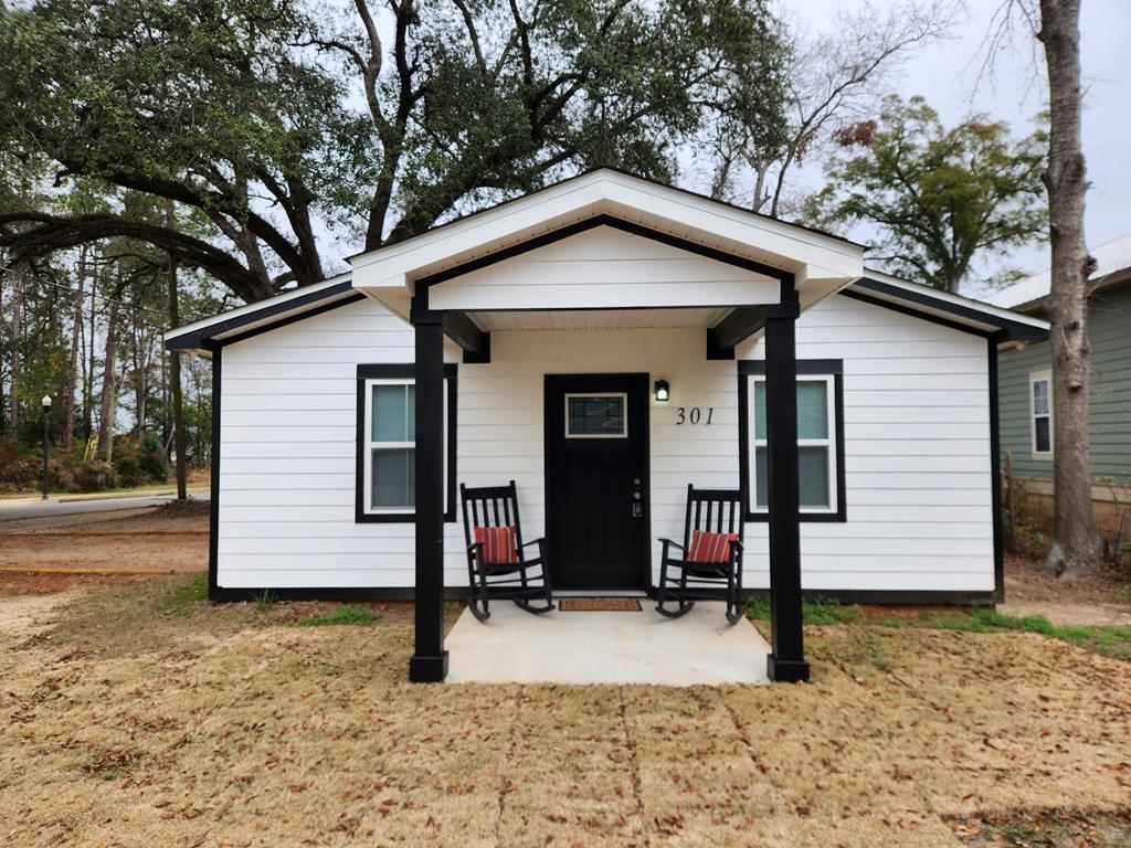 view of home's exterior featuring a carport