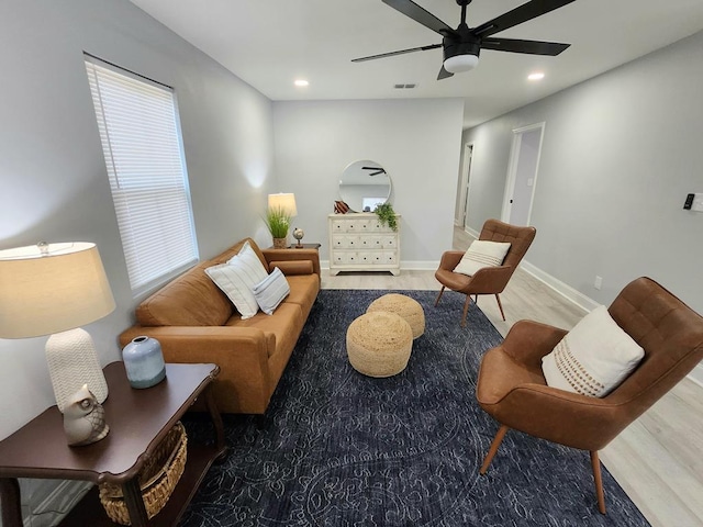 living area with visible vents, baseboards, ceiling fan, wood finished floors, and recessed lighting