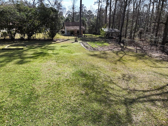 view of yard featuring fence