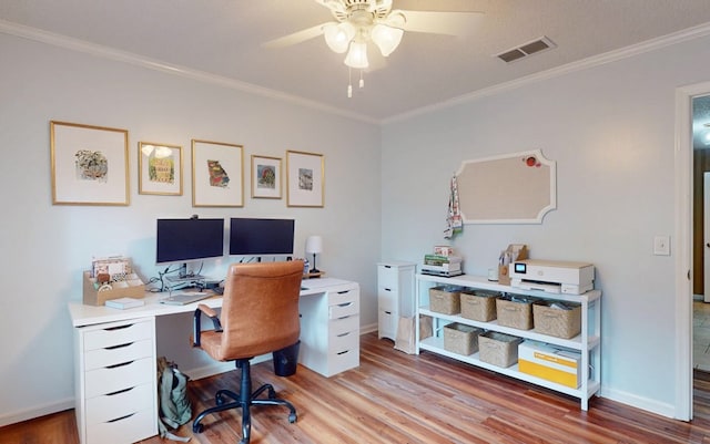 232 Cherokee Cir, Thomasville, GA 31757 - home office featuring a ceiling fan, wood finished floors, and crown molding