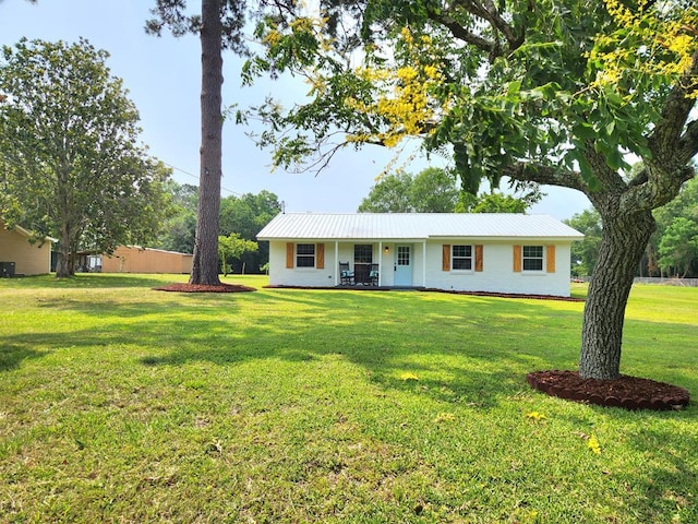 382 Libby Ln, Thomasville, GA 31757 - single story home with a porch, a front lawn, and metal roof