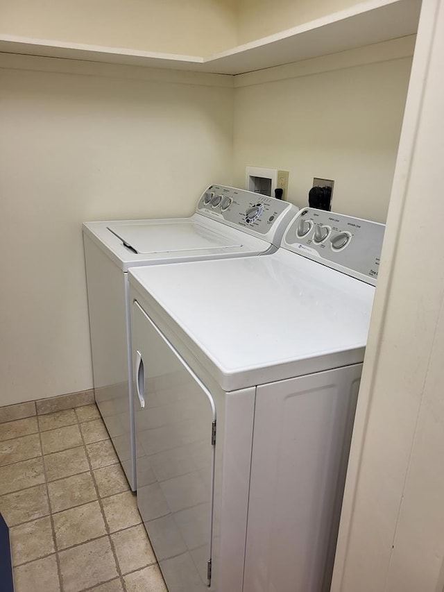 208 Pine St, Quitman, GA 31643 - laundry area featuring washing machine and clothes dryer and baseboards