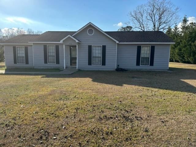 ranch-style house with a front yard