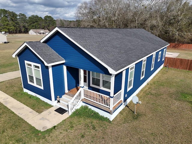 view of front of house featuring a porch and a front lawn