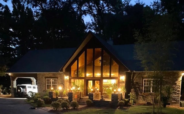 151 Lewis Rd, Cairo, GA 39828 - view of front of home with an attached garage and stone siding