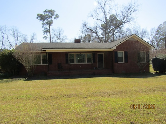 ranch-style home with a chimney, brick siding, crawl space, and a front yard