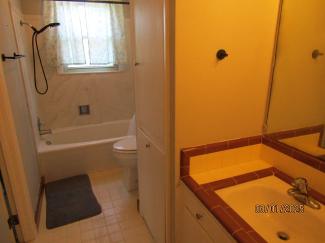 bathroom featuring toilet, bathtub / shower combination, and vanity