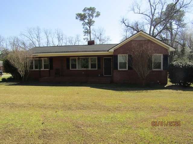 ranch-style house with brick siding, a chimney, covered porch, a front yard, and crawl space